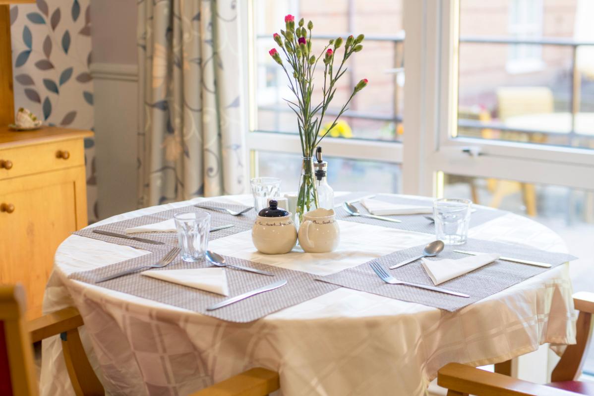 dining table set for dinner at gilmerton care home