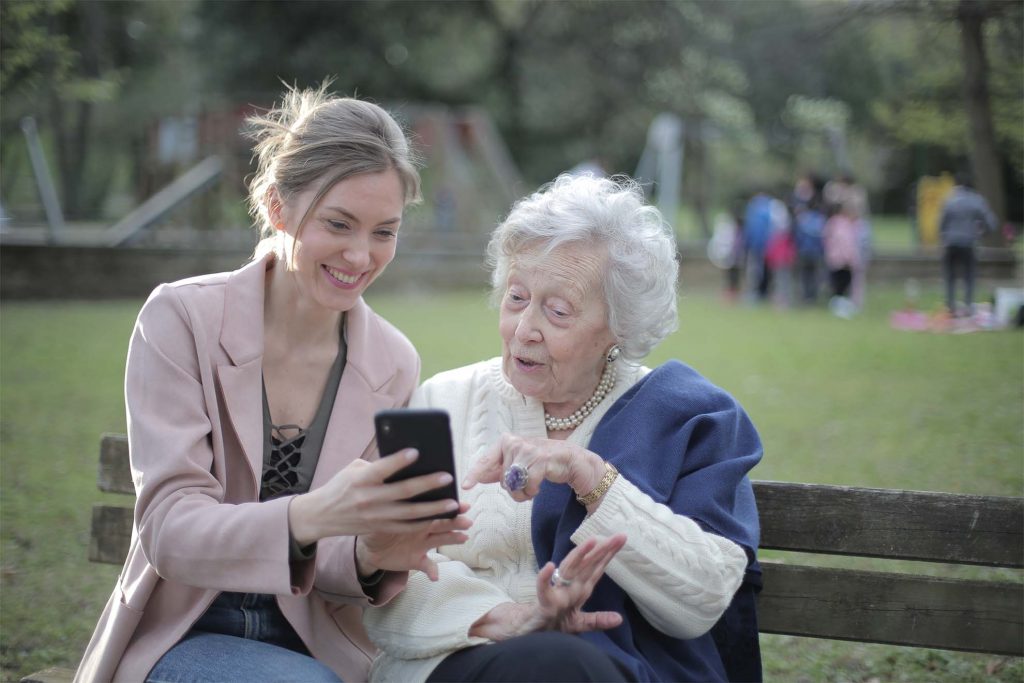 Resident sitting with carer