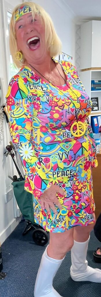 staff in 60s costume